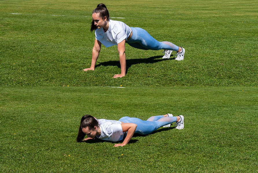 Tytt treenaa ja tekee punnerruksia