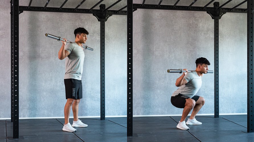 Mies suorittaa kyykyn tanko selssn.